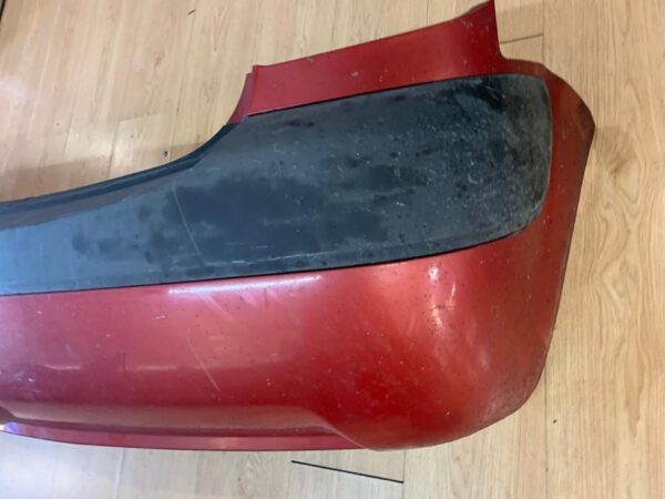 PARAGOLPES TRASERO KIA RIO (JB)