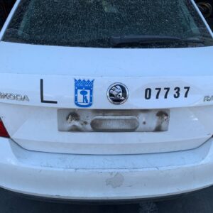 TAPA MALETERO SKODA RAPID (NH)