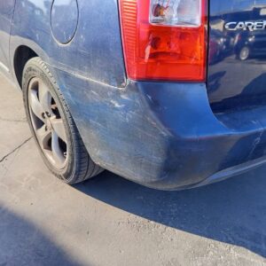 PARAGOLPES TRASERO KIA CARENS (UN)